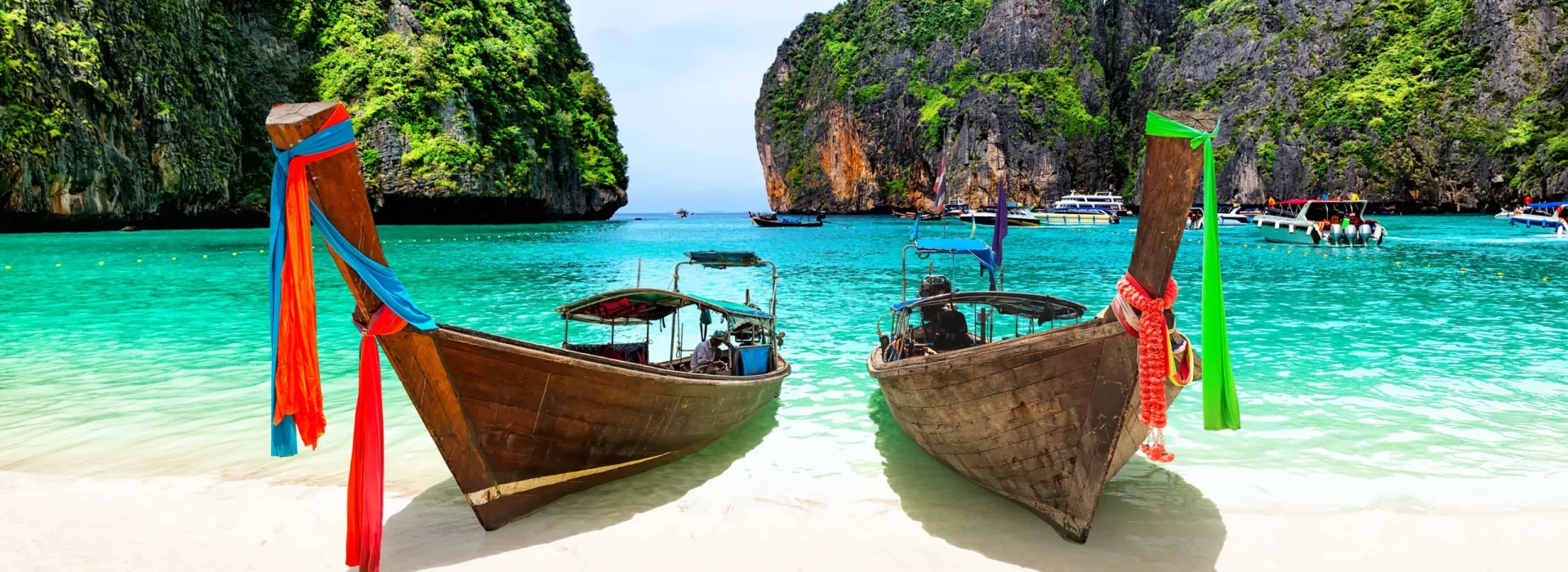 thai-traditional-wooden-longtail-boat-and-blue-sky-in-Maya-bay-Thailand